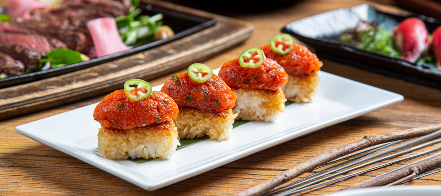 Sunda signature dishes Crunchy Hamachi
Spicy Edamame
Wagyu Crispy Rice